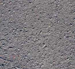 texture of gray cement with cracks and scuffs, full frame