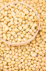 A pile of soybeans in a bamboo basket