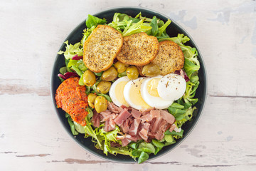 Fresh fruits salad and ham with egg