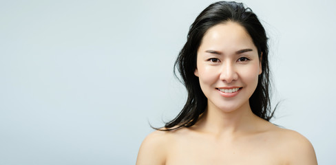 Portrait nude young Asian woman Close up of beautiful faces Feel Happy. Smile with a healthy white teeth.