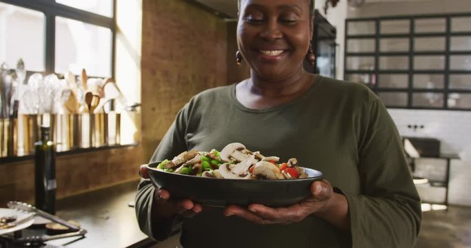 Chef showing her dish