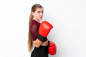 Sport teenager girl over isolated white background with boxing gloves