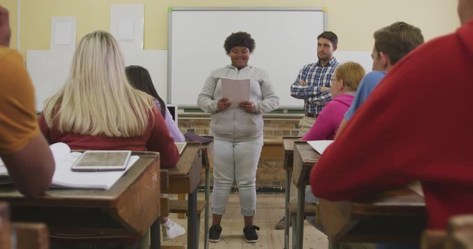 African American High School Girl Presenting To A Group Of Teenagers