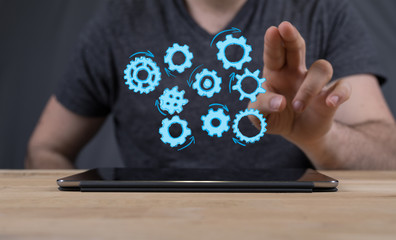 Business, Internet and technology concept. Business select gear icon on virtual screen.