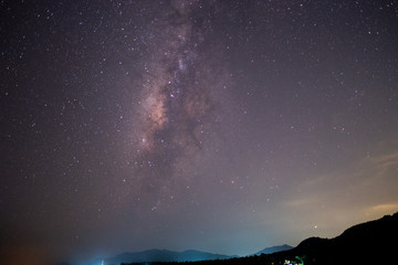 The stars and the milky way in the dark sky at night are very beautiful.