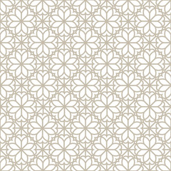 Abstract floral seamless pattern. Arabic ornament with geometric shapes. Abstract motives of the paintings of ancient Indian fabric patterns.