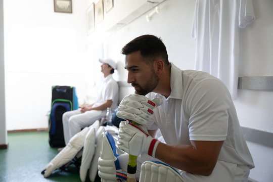 Man thoughtful before playing in the locker room