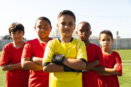 Fototapeta Front view of soccer team looking at the camera