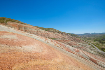 Orange Soil and Mountains in Caucasus