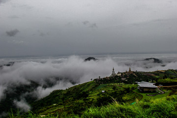 Blurred nature background of mist covering the trees on the mountains, scenic spots along the way, cool breezes