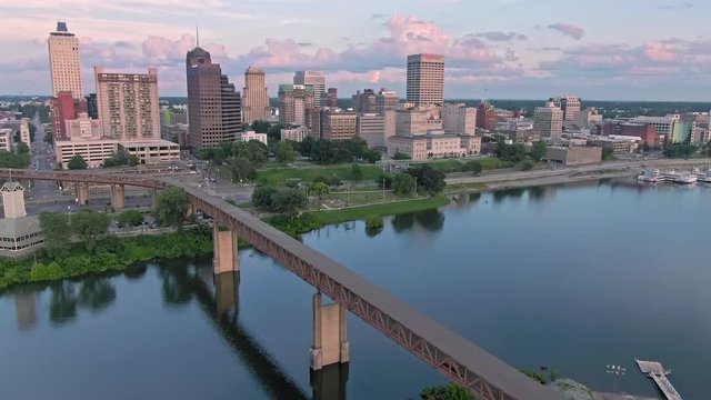 Aerial flying over downtown Memphis and Wolf River Harbor at sunset. Memphis, Tennessee, USA