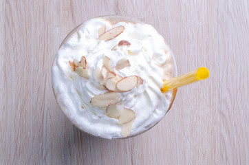 Chocolate and arequipe milkshake accompanied by nut chunks