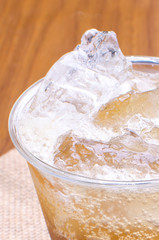 Flavored soda with lots of ice and lemon