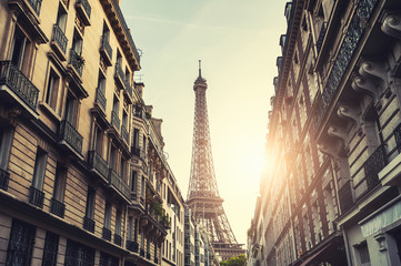 Eiffel Tower at sunset in Paris, France. Vintage filter, retro effect. Famous travel destination