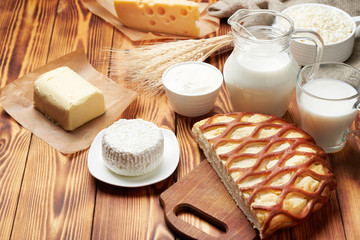 Curd pie, sour cream, butter, cheese, ears of wheat