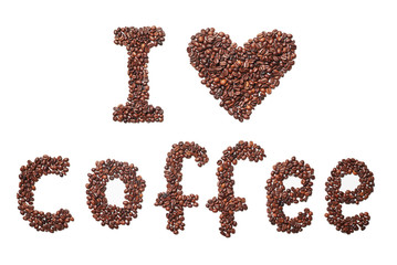 I love coffee. Heart and the inscription of coffee beans, on a white isolated background. Concept. View from above.