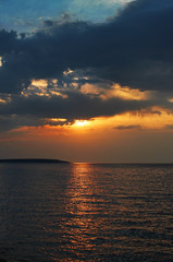 Colorful sunset over the Kremenchuk water reservoir on the Dnieper river, Svetlovodsk embankment, Kirovograd region, Ukraine. Ukrainian landscape.
