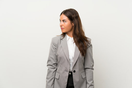 Young Business Woman Over Isolated White Background Looking Side