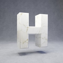 White marble letter H uppercase on concrete background