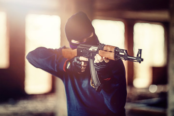 airsoft soldier with a rifle playing strikeball.