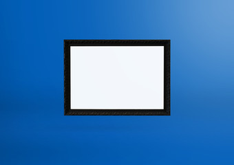 White empty black frame mockup. Black vintage frame on blue color clean background.