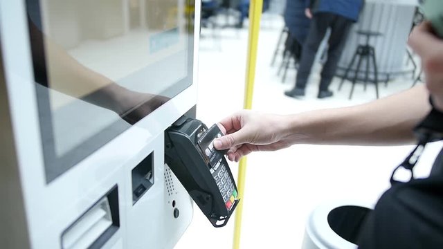 Internet banking using a smartphone. Life style. Easy payment using a smartphone or digital device. Communication through the app for sale in the store. Man shopping online on a sunny day with a