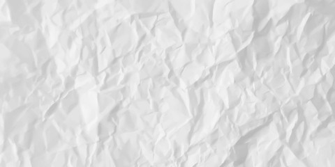 Texture of sheet of white crumpled paper. Wrinkled paper background