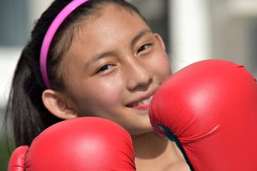 Happy Sporty Diverse Female Boxer Wearing Boxing Gloves