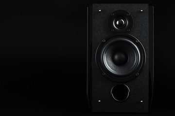 Audio speaker system on a black background. Minimalistic concept