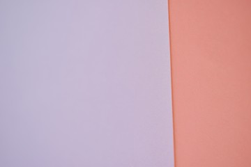 flat lay of pastel color paper in pink and orange