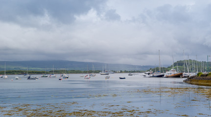 Boats at moorings in Tobermory bay. Hebrides islands, Scotland.
