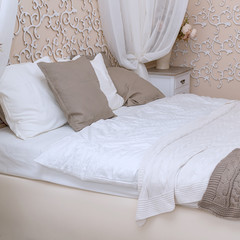 Double bed in the bedroom with two pillows