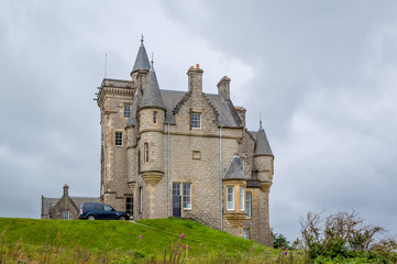 Fototapeta na wymiar Old Glengorm Castle on the hill. Inner hebrides- Island of Mull, Scotland.
