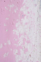 pink background the texture of the cracked paint resembles a shell
