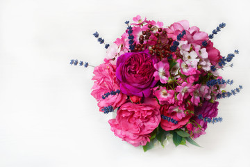 Pink round bouquet of roses on white background. Greeting card concept