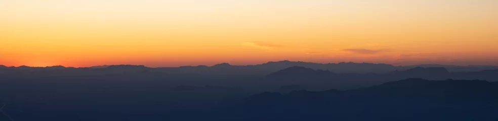 Fotobehang Oranje Sunset over Arizona mountain silhouettes   © Dawn