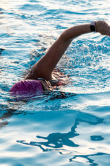 Close up of female swimmer in pool