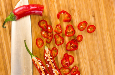 red hot chili peppers on a wooden board