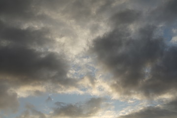 Clouds with sunlight and blue color during evening sunset 