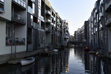 Fototapeta na wymiar Living in the modern district on canals, 