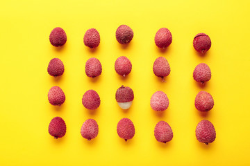 Tasty lychee on yellow background