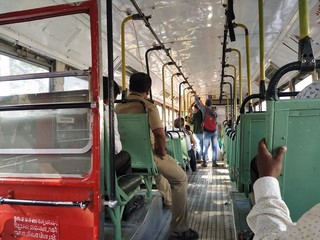 Mumbai, Maharastra/India- February 28 2020: People travelling in the city bus.