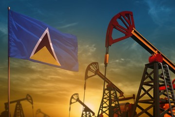 Saint Lucia oil industry concept. Industrial illustration - Saint Lucia flag and oil wells against the blue and yellow sunset sky background - 3D illustration