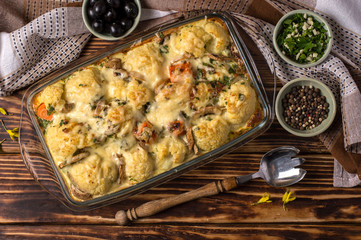 baked cauliflower with cheese and mushrooms.