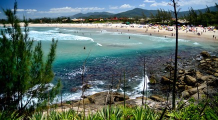 View of sea and rocks in Praia da Ferrugem.