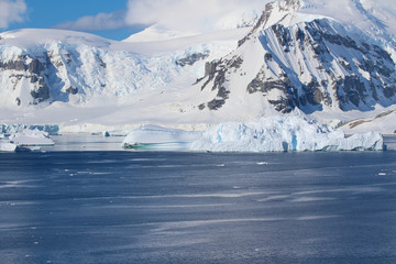 Fototapeta na wymiar Icebergs and mountains along the Gerlache Strait on the Danco Coast, Antarctica