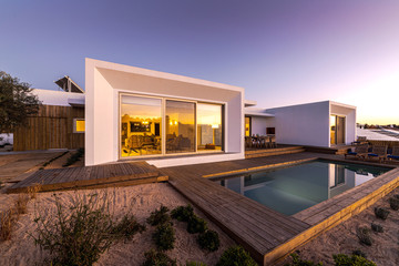 Modern villa with pool and deck - obrazy, fototapety, plakaty