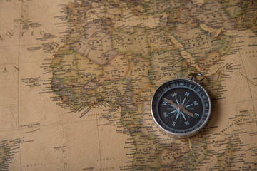 Fototapeta na wymiar Compass on Africa map