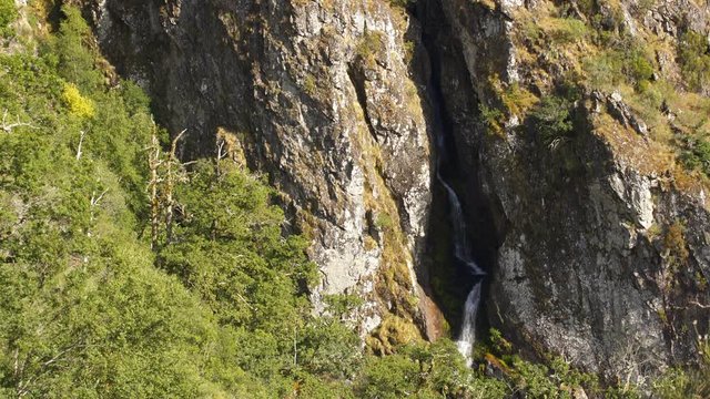 Waterfall with trees in Pitoes das Junias Cascata in Geres national park, in Portugal