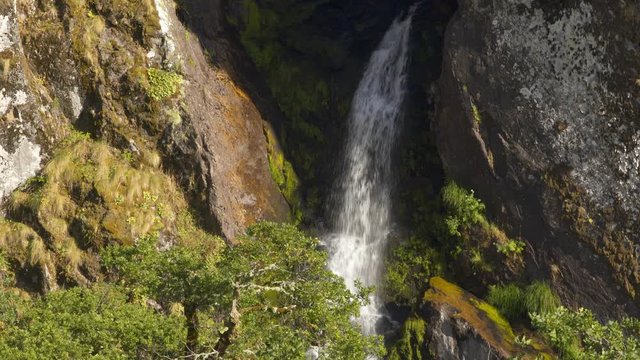 Waterfall with trees in Pitoes das Junias Cascata in Geres national park, in Portugal